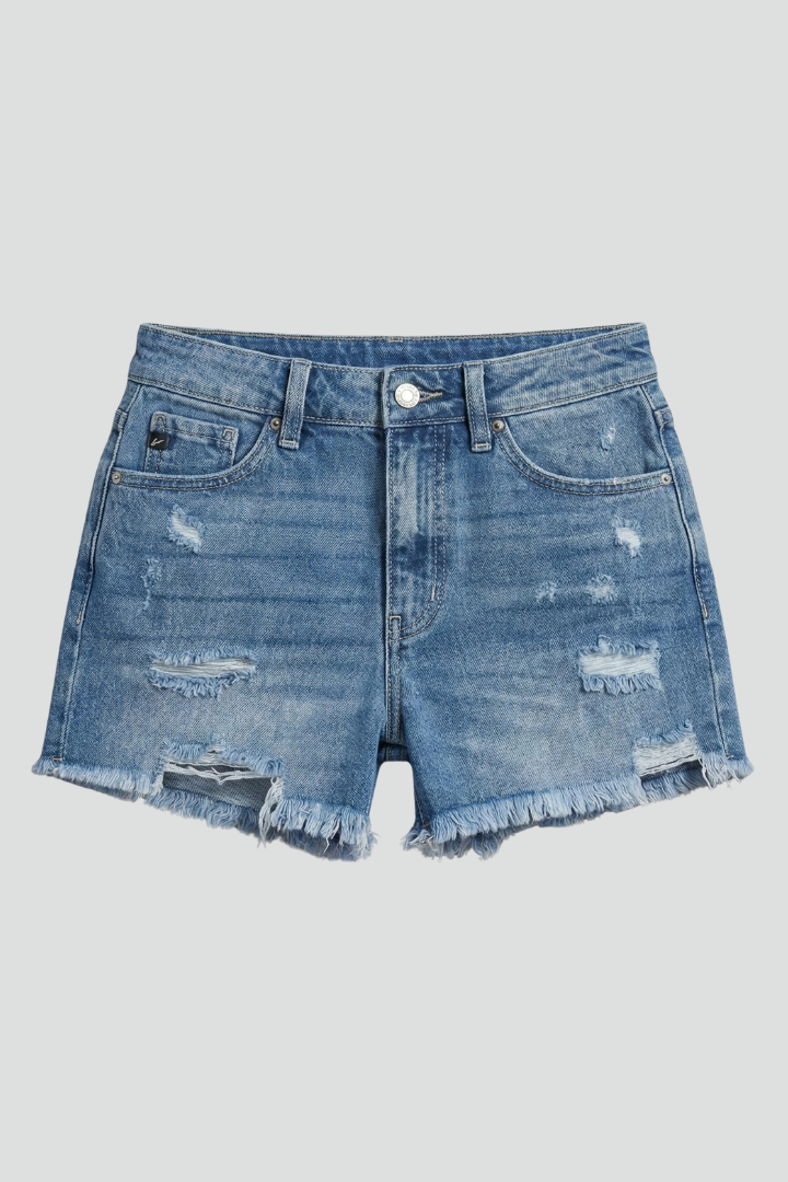 Stella | Damens slitna denimshorts med fransad kant