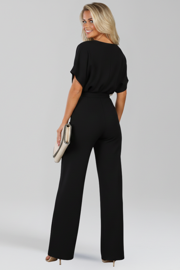 Danielle | Klassisk Jumpsuit Med Knytskärp Och Vida Ben För Dam